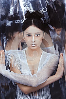 Shot of a futuristic young asian woman.