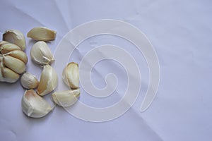 Shot garlic on a white background.