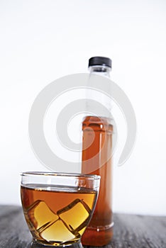 Shot glass of bourbon whiskey