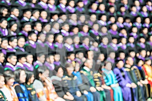 Shot of graduate at graduation ceremony. The image was blurred f