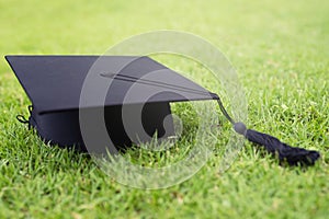 Shot of graduation hats on the grass, concept during commencement success graduates of the university,Concept education congratula