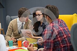 Shot of a group of young business professionals having a meeting.