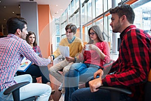 Shot of a group of young business professionals having a meeting.