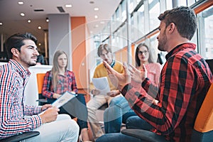 Shot of a group of young business professionals having a meeting.