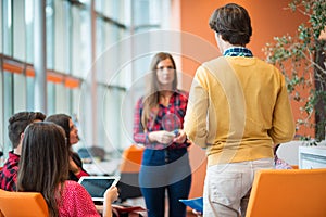 Shot of a group of young business professionals having a meeting.