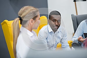 Shot of a group of young business professionals having a meeting.