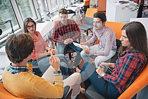 Shot of a group of young business professionals having a meeting.