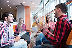 Shot of a group of young business professionals having a meeting.