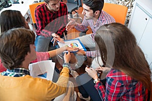 Shot of a group of young business professionals having a meeting.