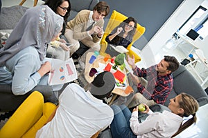 Shot of a group of young business professionals having a meeting.