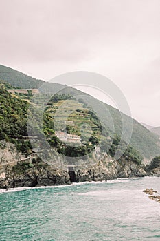 Shot of hilly seashore scenery in Monterosso al Mare, Cinque Terre, Italy