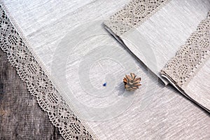 Shot of linen towels, tablecloths, napkins with lace trim