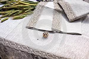 Shot of linen towels, tablecloths, napkins with lace trim