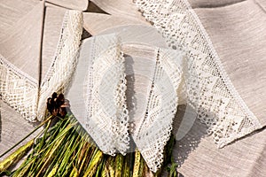 Shot of linen towels, tablecloths, napkins with lace trim