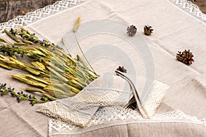Shot of linen towels, tablecloths, napkins with lace trim photo
