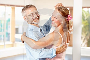 Theyve been dancing like this for years. Shot of a mature couple ballroom dancing together indoors.