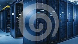 Shot of Modern Data Center With Multiple Rows of Operational Server Racks. Modern High-Tech Databa