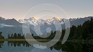 A shot of mt cook and lake matheson at sunset in nz