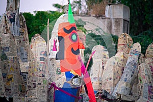 Shot on multiple paper effigy statues of ravan the demon king who is burnt on the hindu festival of dussera as foretold