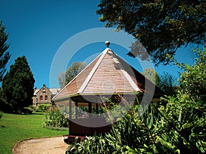 A shot of octagonal shaped gazebo on a public park