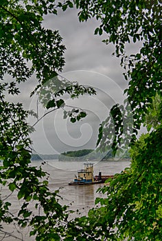 Tugboat Chugging Along the Missouri River