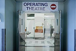 Open for surgery. Shot of open doors leading to an operating room in a hospital.