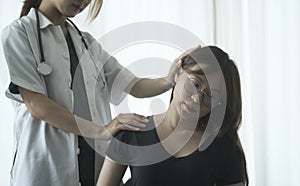 Shot of physiotherapist doing treatment with patient in clinic. Physiotherapy rehab, injury recovery and healthcare concept