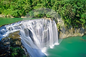 Shifen Waterfall - Famous nature landscape of Taiwan, shot in Pingxi District, New Taipei, Taiwan. photo