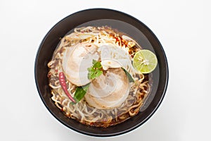 Shot ramen isolated in studio on white background, Fusion food with Thai style