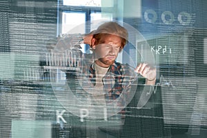 Young concentrated computer developer writing new code