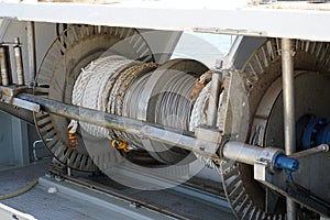 Shot of a rope and steel winches on a fishing boat for hauling in the nets