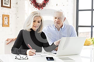 Shot of a senior couple using a laptop together at home