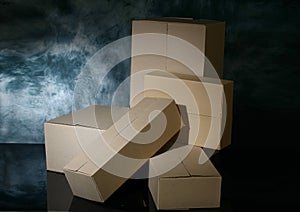 Shot of a set of different sized cardboard packaging