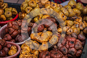 A shot of snake fruits taken at a local market in Bintulu, Malaysia.
