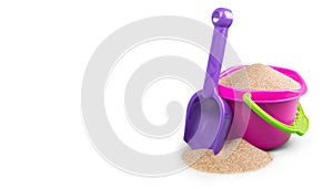 Shot of spade and bucket with sand