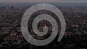 Shot view from hill to evening los angeles with its illuminate lights