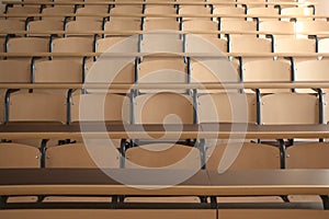 Shot of well organized empty university classroom seats due to global pandemic