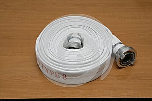 A shot of a white fire hydrant hose
