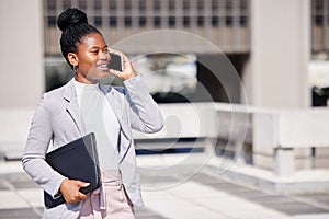 Id love to meet to discuss this. Shot of a young businesswoman making a phone call using her smartphone.