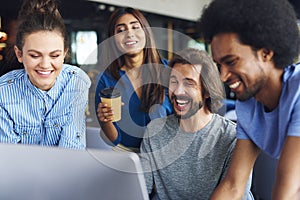 Shot of young coworkers sharing concepts together photo