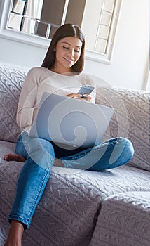 Shot of a young woman relaxing at home on the weekend