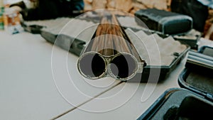 Shotgun barrel in the table