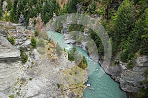 The shotover river cutting through a rocky gorge photo