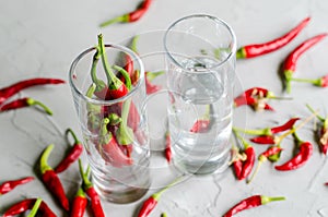 Shots with vodka and chilly peppers