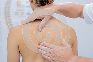 shoulder blades physiotherapist manipulation in doctors hospital office