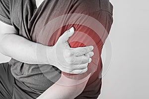 Shoulder injury in humans . shoulder pain,joint pains people medical, mono tone highlight at shoulder