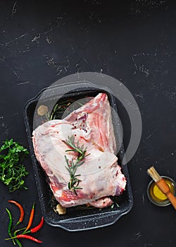 Shoulder of lamb ready before slow cooking