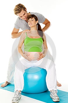 Shoulder massage pregnant woman