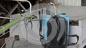 Shoulder-mounted pesticide sprayer for gardening and yard work. Agricultural sprayer. Knapsack battery sprayer for