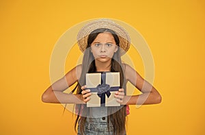 Shouldnt your purchase be unique too. Serious child hold gift box. Holiday celebration. Gift shop. Packaging purchase